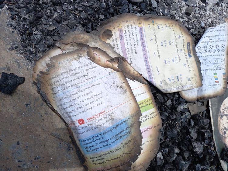 At Matarmat primary school in Bomet East what remains are ashes and smoke billowing from the debris of scattered textbooks in a fire incident that gutted the main administration block.