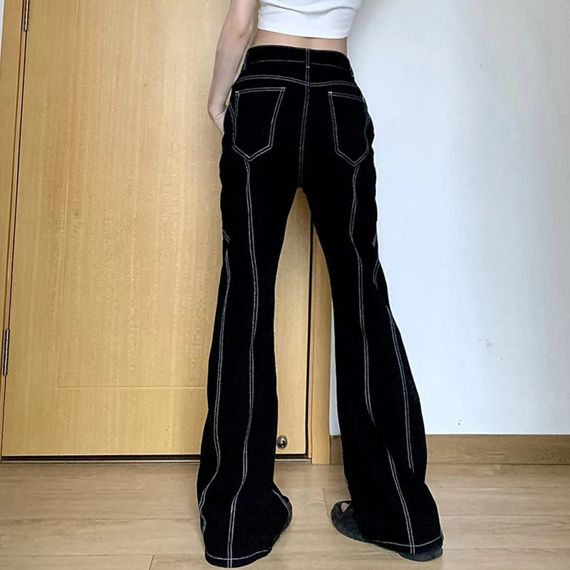 Jean skinny taille basse à ligne brillante fendue, drapé, coupe slim, ajustement haut, pour une silhouette élancée et tendance.