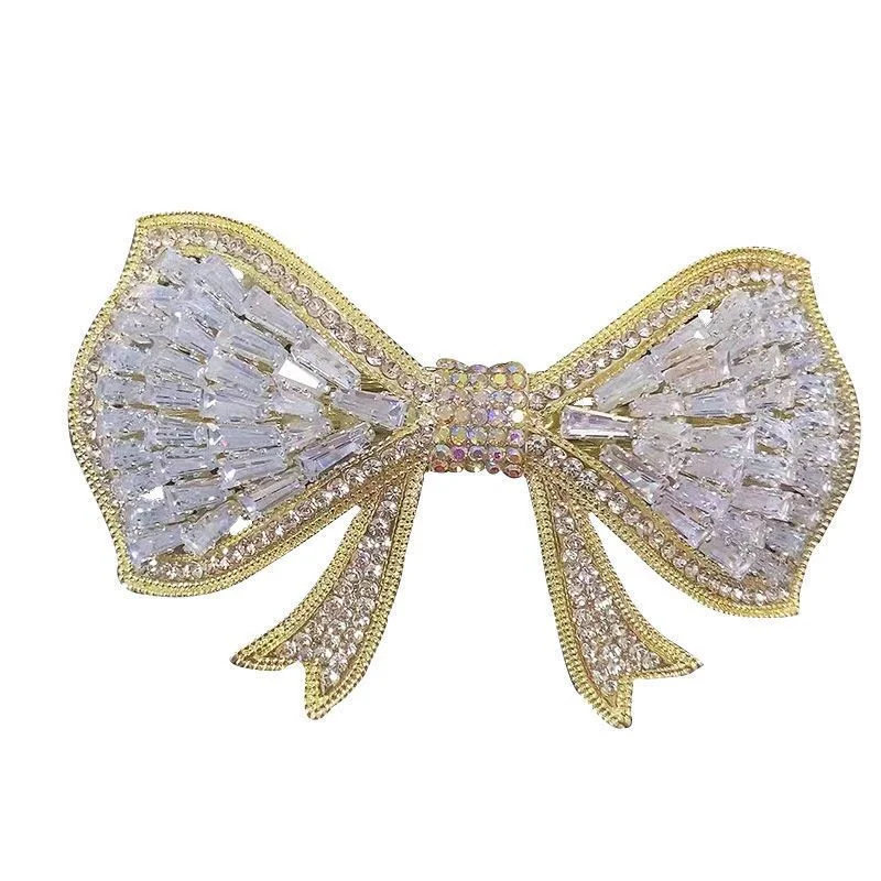 Grote haarspeld strik, lichte luxe haaraccessoire. Verfraai je kapsel met deze elegante haarversiering en straal!