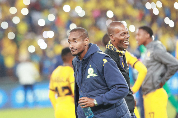 Mamelodi Sundowns coach Rulani Mokwena (front) and his Kaizer Chiefs counterpart Arthur Zwane during the DStv Premiership match at FNB Stadium in Johannesburg on January 21 2023.