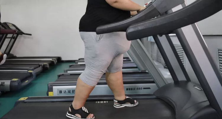 A woman on a treadmill in China