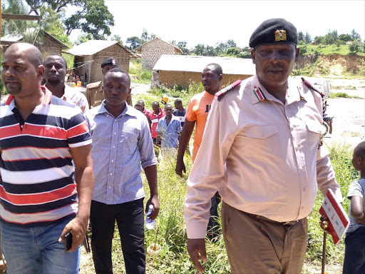 Kisauni MP Ali Mbogo and deputy county commissioner Kipchumba Ruto in Kidagaya on Saturday / BRIAN OTIENO