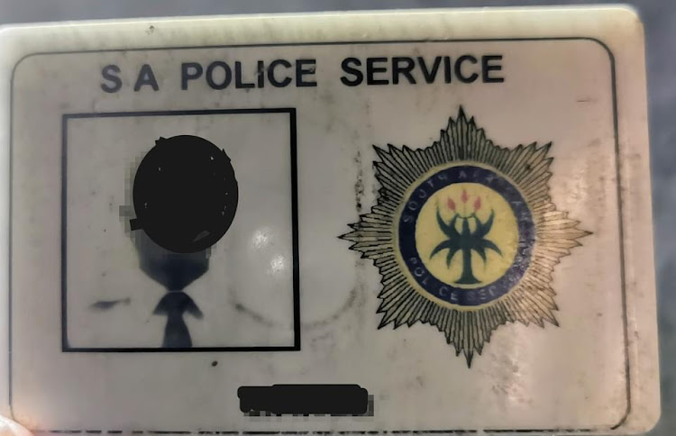 A policeman's identification/appointment card was found in a vehicle being used by alleged hijackers outside Durban on Friday