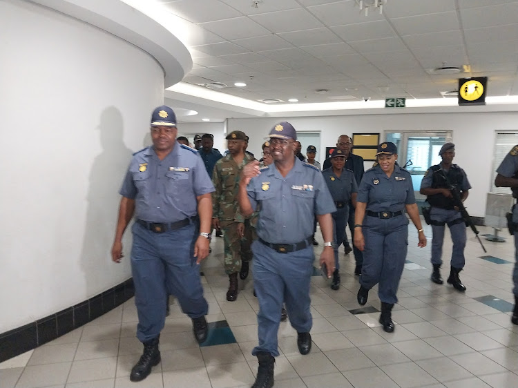 National police commissioner Gen Fanie Masemola , Gauteng commissioner Lt-Gen Elias Mawela and deputy national commissioner Lt-Gen Tebello Mosikili conduct a walkabout at OR Tambo international airport ahead of the EFF planned shutdown.