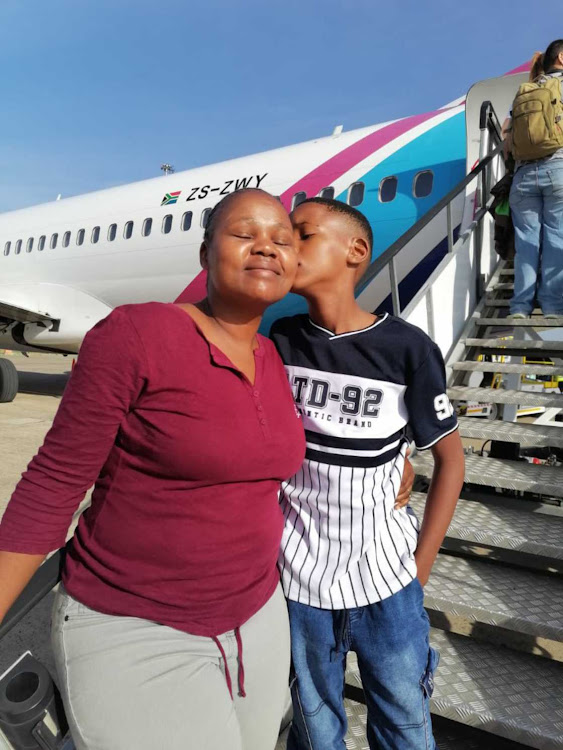 Precious Thebe and her son Kgosi, who was barred from going inside MSC Splendida.