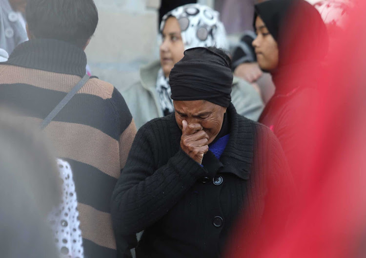 Community members at the funeral of six-year-old Stacey Adams in Eastridge, Mitchells Plain. Stacey's body was found opposite her grandmother's house in a shallow grave next to a Wendy house.