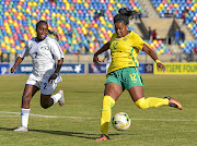 Banyana  striker  Jermaine Seoposenwe, right, is confident  they will qualify for the Olympics and World Cup. 