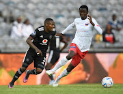 Veluyeke Zulu of Chippa United challenges Thembinkosi Lorch of Orlando Pirates, left, in a league match at Orlando Stadium. Lorch only recently returned from injury.