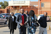 MSG Group chairperson Given Mkhari and his wife Ipeleng leave the Randburg Magistrate's Court in Johannesburg on July 16, 2018 after the pair laid assault charges against each other. 