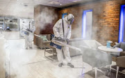 Coronafog staff use thermal fogging machines to disinfect a building. The advertising watchdog says the company's claims that it can kill the Covid-19 virus 'are currently unsubstantiated'.