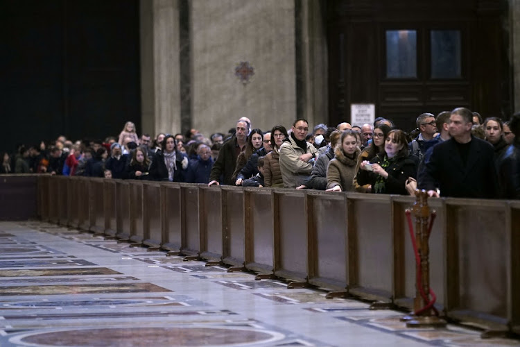 Faithful queue to pay respects to Pope Emeritus Benedict XVI at St Peter's Basilica on January 2.