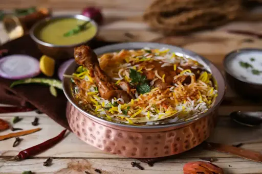 Chicken Dum Biryani Half( With Salan And Raita) Serves 1