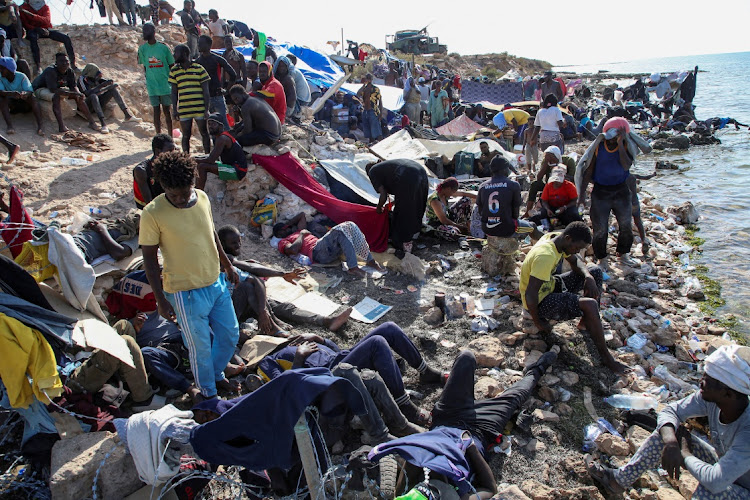 Migrants from Africa pictured next to the seashore at the Libyan-Tunisian border in Ras Ajdir, Libya, on July 23 2023. File image.