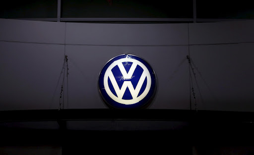 A logo of Volkswagen is illuminated at a dealership in Seoul, South Korea, in this November 25, 2015 file photo. REUTERS/Kim Hong-Ji/Files