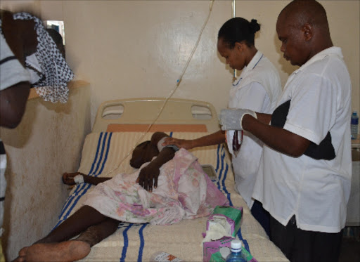 RECOVERING: Medical personnel at the Hola District Hospital attend to one of the victims of Wednesday clashes between the Orma and Somali communities in Chifiri location, Tana River county. Photo/Alphonce Gari