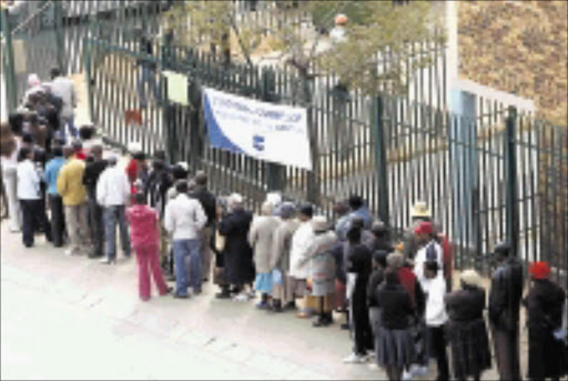 COLD OR NOT: Voters braved the chilly weather in Alexandra township to make their mark in the elections yesterday. 22/04/09. Pic. Antonio Muchave. © Sowetan.