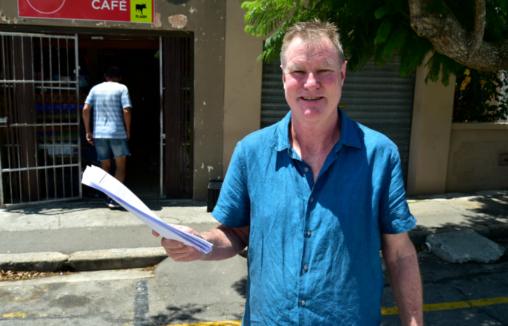 Kevin Slattery, of the residents’ association, with a list of some of the properties that must close down