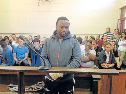 IMPASSIVE: Port Alfred tavern owner Tonny Donile during his brief court appearance yesterday for allegedly murdering popular businessman Noel Maddocks Picture: DAVID MACGREGOR