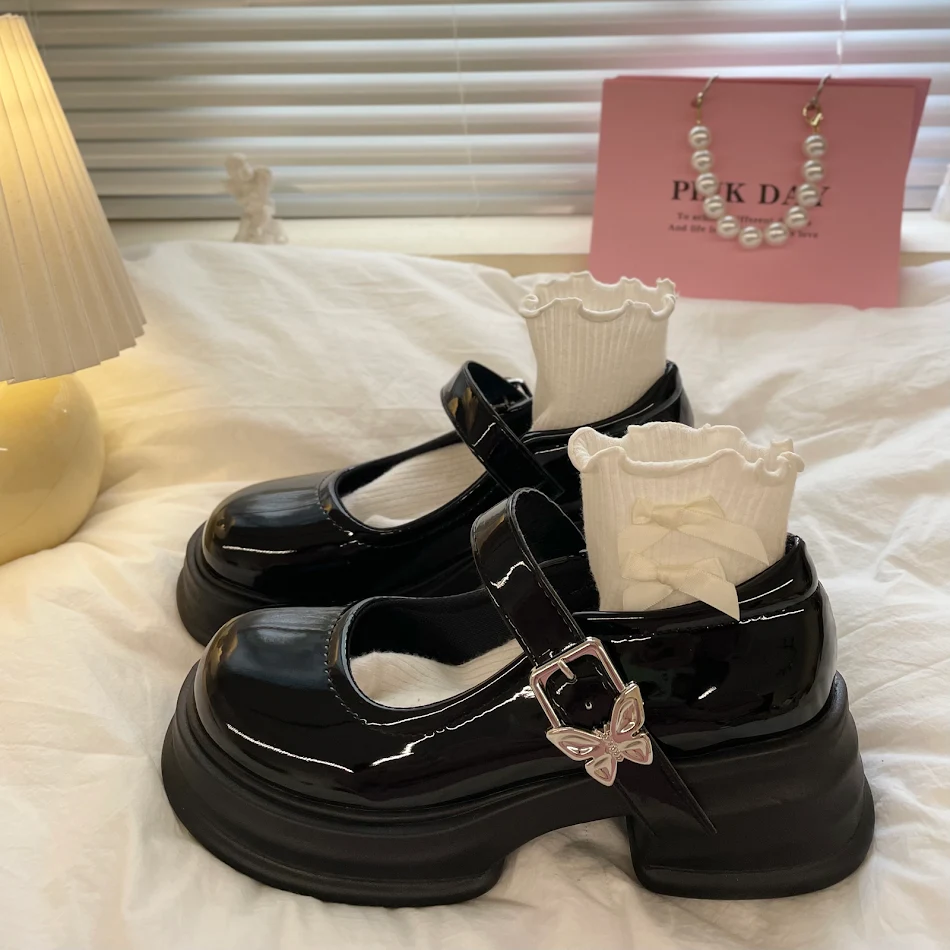 Versatile Black Small Leather Shoes for Women with Round Toe. Comfortable and stylish, perfect for casual or everyday we