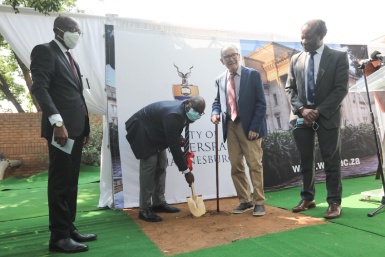 The head of the burns unit at Chris Hani Baragwanath Academic Hospital, Prof Adelin Muganza, Gauteng health department COO Arnold Malotana, Roy McAlpine and Wits VC Prof Zeblon Vilakazi take part in a ground-breaking ceremony at Bara in Soweto, where they plan to build an extension to the burns unit.