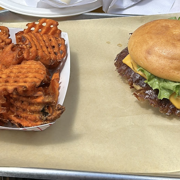 American burger minus tomato on GF bun with sweet potato fries.