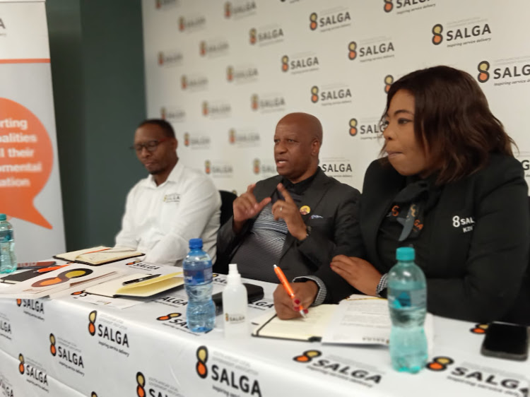 Salga provincial chairperson Thami Ntuli, flanked by Sabelo Gwala and Ntombifuthi Gumede, during a press conference.