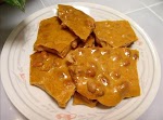 Mom's Easy Peanut Brittle was pinched from <a href="http://www.food.com/recipe/moms-easy-peanut-brittle-101862" target="_blank">www.food.com.</a>