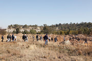 Parliament portfolio committee of minerals and energy members scanning the mine in Krugersdorp where eight women were raped, allegedly by zama zamas.