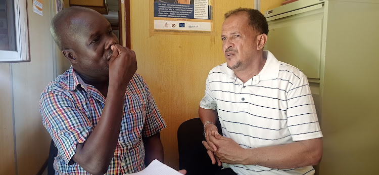 Muhuri's Francis Auma and Nabil's father Ahmed Omar.