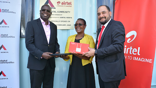 From Left: George Odenyo, ATC MD, Mary Ondieki Mihango primary school headteacher and Ashish Malhotra Airtel Kenya MD.