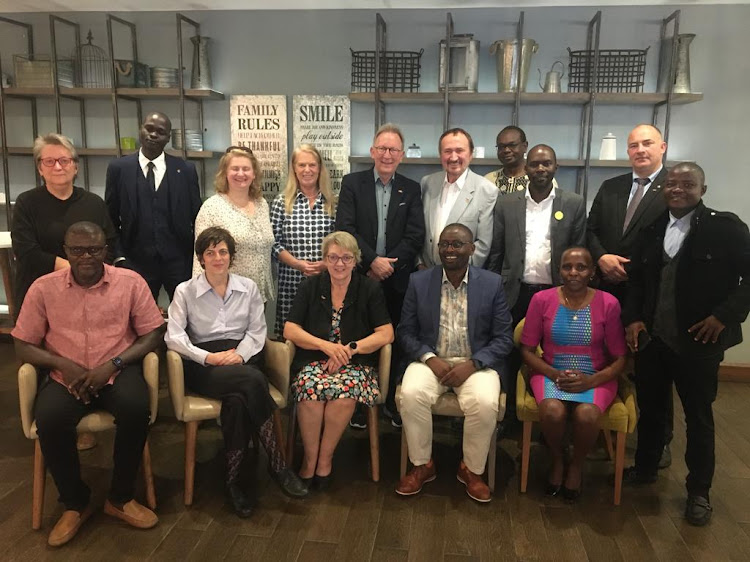 Dr. Ezekiel Mecha with members of the Germany Parliamentary group , Germany Academic Exchange Nairobi Regional Office Director , the protocol and affairs manager at the Germany Embassy in Nairobi and other alumni at Trademark Hotel , Nairobi where they were having a consultative meeting on increased funding by the Germany government to support alumni activities