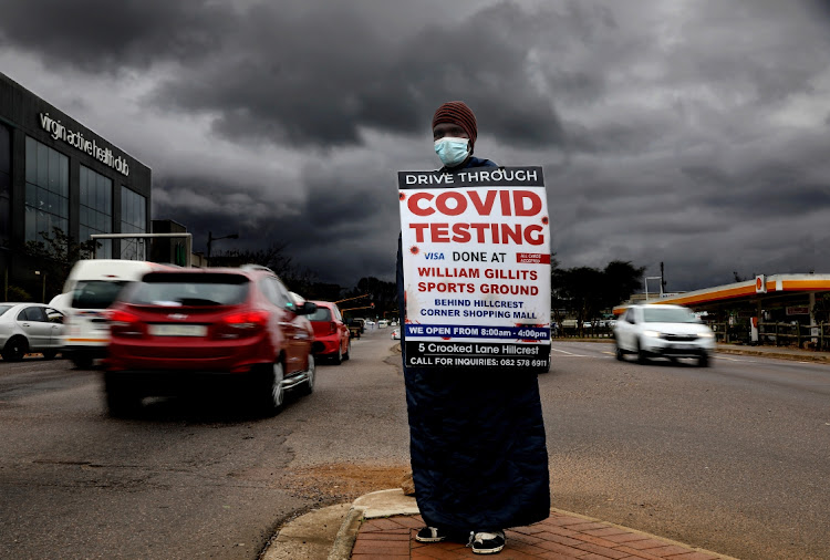 As vaccinations lag, Lucky Makhoba, 33, does his bit to spread the word in Hillcrest, KwaZulu-Natal, about another aspect of Covid prevention.