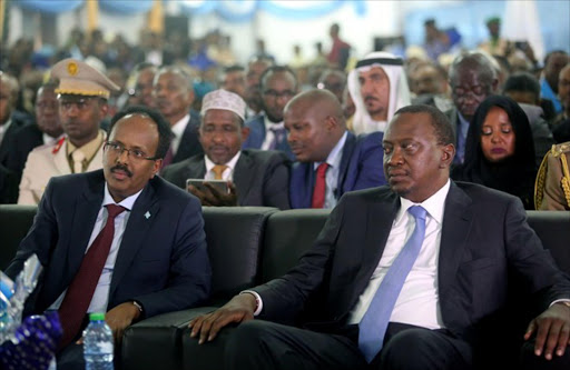 President Uhuru Kenyatta with his Somali Counterpart Mohamed Abdullahi Farmaajo, during his inauguration ceremony in Mogadishu, Somalia.