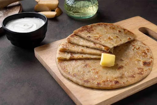 Aloo Paratha With Achar And Tomato Sauce