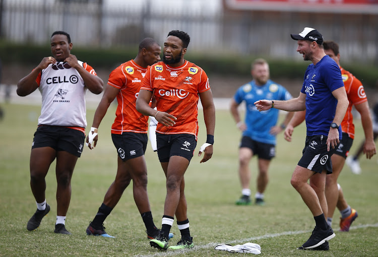 Lukhanyo Am (C) and his Cell C Sharks teammates hard a training at Jonsson Kings Park in Durban on May 28, 2019.