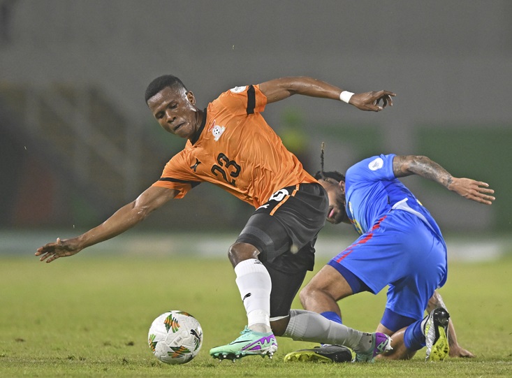 Rodrick Kabwe of Zambia is challenged by Theo Mbulofeko Batombo Bongonda of DR Congo during their 2023 Africa Cup of Nations (Afcon) match at Laurent Pokou Stadium in San Pedro, Cote dIvoire on 17 January 2024.