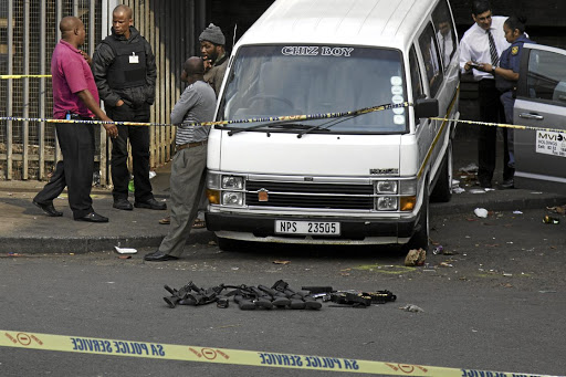 Shooting incidents such as this one in Durban's Brook Street taxi rank are claiming dozens of lives of taxi operators across SA. In Gauteng, two owners were killed at the weekend, despite the ongoing commission. / Rogan Ward