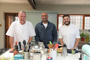 Chefs with Compassion chair Arnold Tanzer and Compass Insure MD Ismail Ismail with J Something, lead singer of Mi Casa and celebrity foodie, who is one of the many kitchen stars who have dedicated time to the Chefs with Compassion effort. 