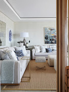 The home features two lounges; this one featuring serene blue accents.