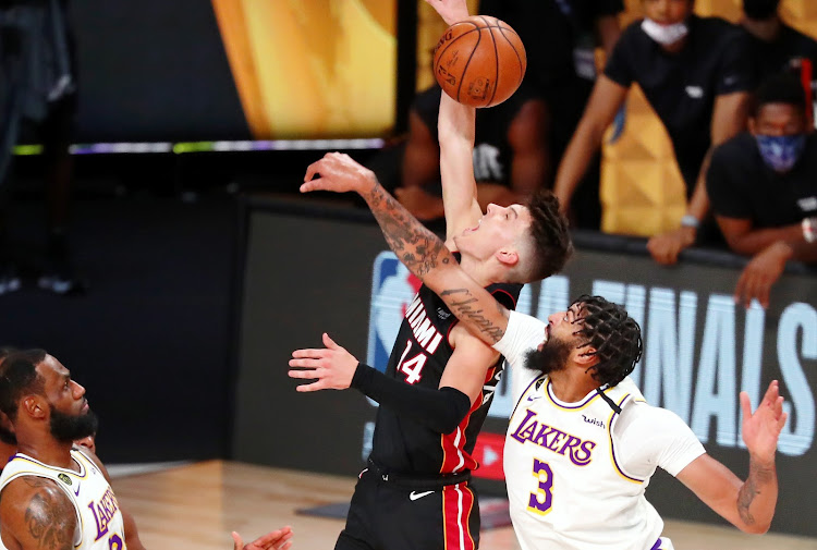 Los Angeles Lakers forward Anthony Davis blocks a shot from Miami Heat guard Tyler Herro