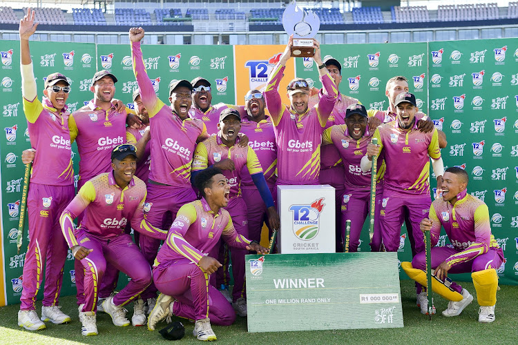 The Paarl-based Gbets Rocks team celebrate after winning their maiden Cricket SA domestic T20 Challenge at St Georges Park in Gqeberha February 27 2022.