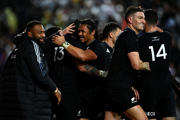 Rieko Ioane of the All Blacks celebrates with teammates after scoring a try during the Rugby Championship match against Argentina at FMG Stadium Waikato on September 03, 2022 in Hamilton, New Zealand.