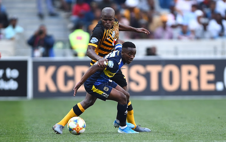 Thabo Nodada shields the ball from his marker during an Absa Premiership match.