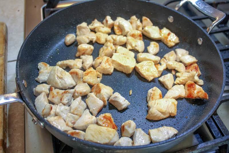 Browning Chicken In Sesame Oil.