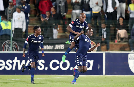 Bidvest Wits' striker Cuthbert Malajila (R) of Bidvest Wits celebrates with teammates during the Absa Premiership 2016/17 match against Orlando Pirates at Bidvest Stadium in Johannesburg, South Africa on 04 May 2017. Wits won 1-0.