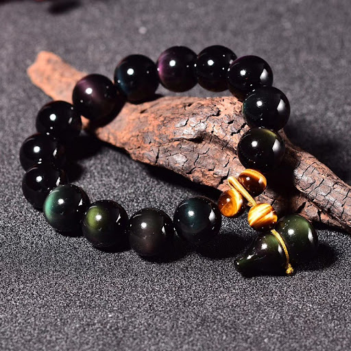 Title 2, Kleine kalebas obsidiaan armband