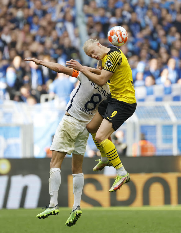 Borussia Dortmund's Erling Braut Haaland in action with VfL Bochum's Anthony Losilla