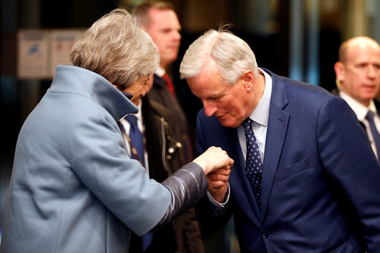 European Union's chief Brexit negotiator Michel Barnier welcomes British prime minister Theresa May in Strasbourg, France on Monday.