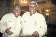 MENTORS:
      
      
      
      Bloemfontein Celtic's late co-founding director Norman Mathobisa with Petrus 'Whitehead' Molemela 
      
      at a sports function
      
      .
        Photo: Teboho Setena