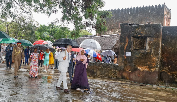 The Principal Curator, Fort Jesus National Monument Fatma Twahir takes King Charles III around Fort Jesus on November 3, 2023.